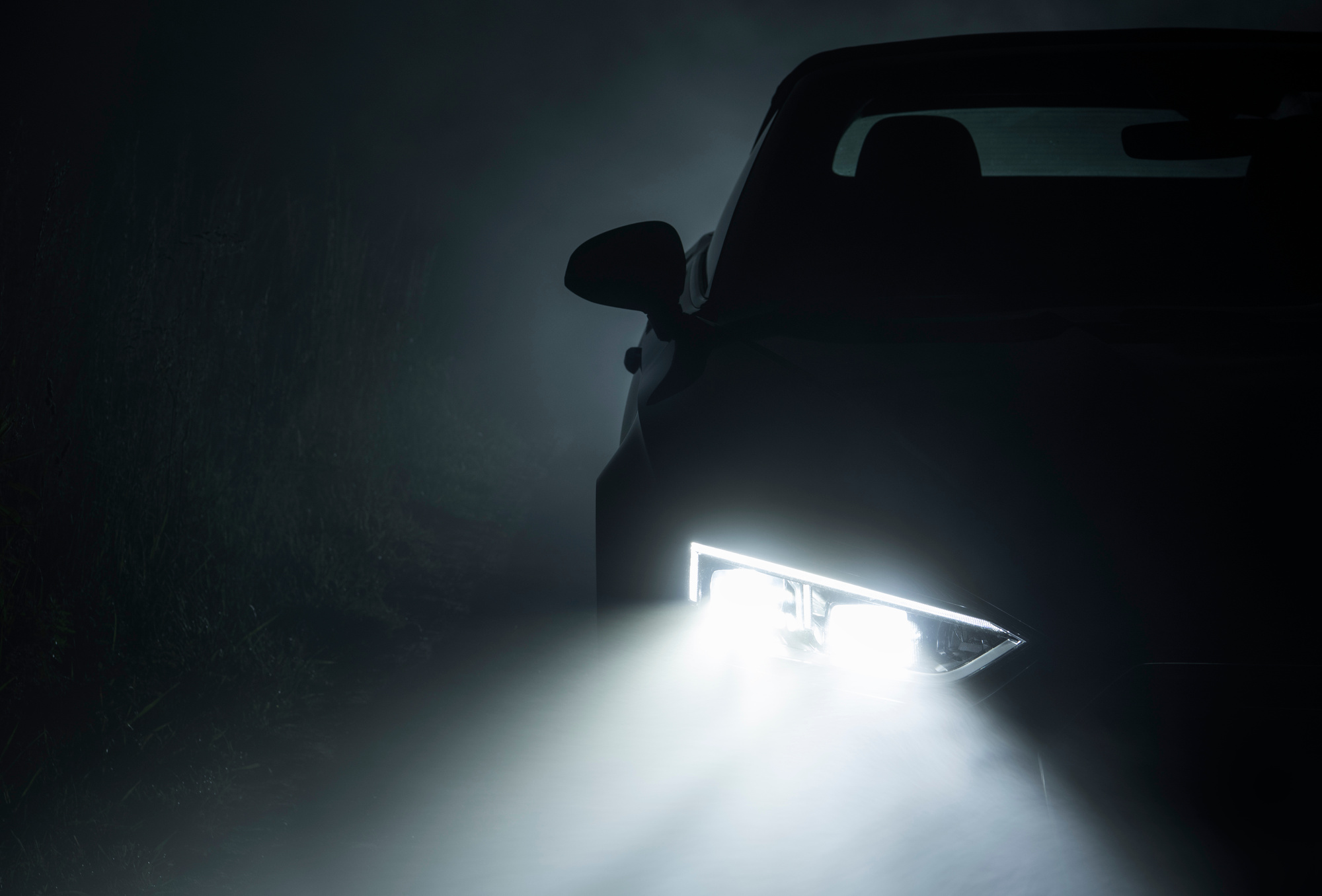 Modern Active Car LED Headlights Performing in Fog